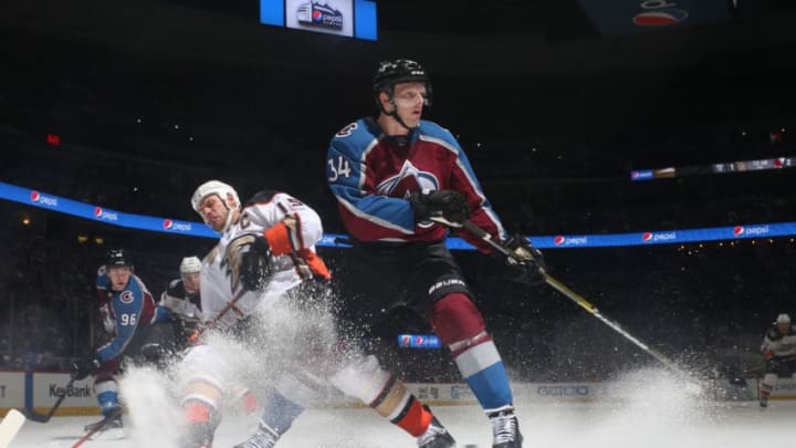 DENVER, CO - MARCH 15: Carl Soderberg #34 of the Colorado Avalanche battles for position against Ryan Getzlaf #15 of the Anaheim Ducks at the Pepsi Center on March 15, 2019 in Denver, Colorado. The Ducks defeated the Avalanche 5-3. (Photo by Michael Martin/NHLI via Getty Images)