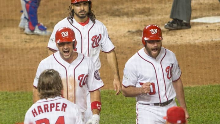 WASHINGTON, DC - OCTOBER 07: Washington Nationals first baseman Ryan Zimmerman (11) and second baseman Daniel Murphy (20) after Washington Nationals first baseman Ryan Zimmerman (11) had hit a game winning three run homer in the eighth inning during game two of the NLDS between the Chicago Cubs and the Washington Nationals on October 7, 2017, at Nationals Park, in Washington D.C. The Nationals defeated the Cubs 6-3.(Photo by Tony Quinn/Icon Sportswire via Getty Images)