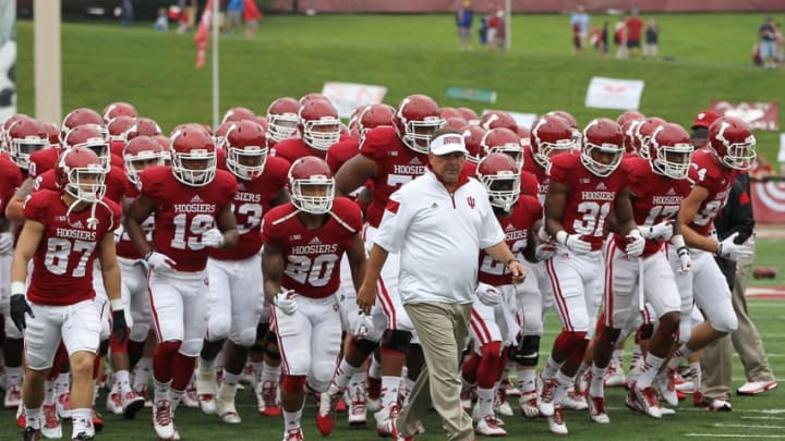 Aug 30, 2014; Bloomington, IN, USA; Indiana Hoosiers head coach Kevin Wilson leads the team off the field before the game against the Indiana State Sycamores at Memorial Stadium. Indiana won 28-10. Mandatory Credit: Pat Lovell-USA TODAY Sports