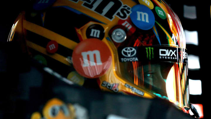 RICHMOND, VA - APRIL 12: Kyle Busch, driver of the #18 M&M's Toyota, sits in his car during practice for the Monster Energy NASCAR Cup Series Toyota Owners 400 at Richmond Raceway on April 12, 2019 in Richmond, Virginia. (Photo by Sean Gardner/Getty Images)