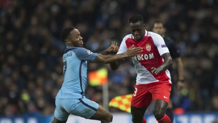 MANCHESTER, ENGLAND - FEBRUARY 21: Raheem Sterling of Manchester City and Benjamin Mendy of AS Monaco in action during the UEFA Champions League Round of 16 first leg match between Manchester City FC and AS Monaco at Etihad Stadium on February 21, 2017 in Manchester, United Kingdom. (Photo by Visionhaus