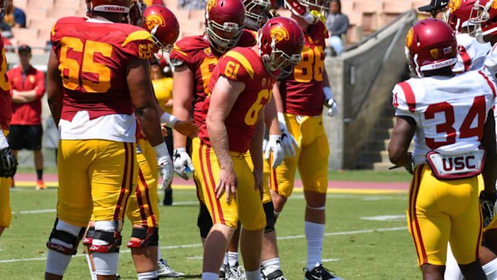 LOS ANGELES, CA - APRIL 15: Southern California snapper Jake Olson (61) gets set up to snap the ball during the USC spring football game on April 15, 2017, at the Los Angeles Memorial Coliseum in Los Angeles, CA. (Photo by Brian Rothmuller/Icon Sportswire via Getty Images)