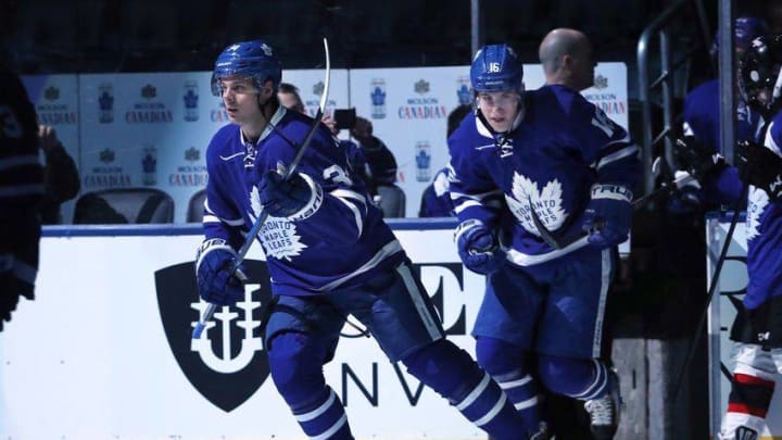 Dec 13, 2016; Toronto, Ontario, CAN; Toronto Maple Leafs center Auston Matthews (34) and center Mitch Marner (16) step onto the ice before the start of their game against the San Jose Sharks at Air Canada Centre. The Sharks beat the Maple Leafs 3-2 in the shootout. Mandatory Credit: Tom Szczerbowski-USA TODAY Sports