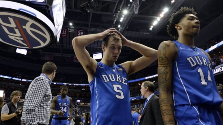 Mar 10, 2016; Washington, DC, USA; Duke Blue Devils guard Luke Kennard (5) and Duke Blue Devils guard Brandon Ingram (14) react after losing to Notre Dame Fighting Irish in the over time 84-79 of during day three of the ACC conference tournament at Verizon Center. Mandatory Credit: Tommy Gilligan-USA TODAY Sports