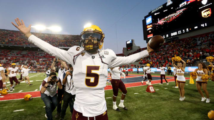 TUCSON, AZ - NOVEMBER 24: Quarterback Manny Wilkins #5 of the Arizona State Sun Devils celebrates in front of the ASU fans following a 41-40 victory against the Arizona Wildcats during the college football game at Arizona Stadium on November 24, 2018 in Tucson, Arizona. (Photo by Ralph Freso/Getty Images)