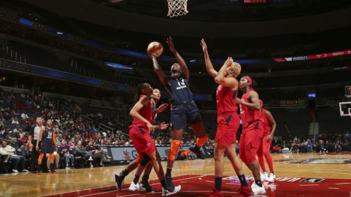 WASHINGTON, DC - JUNE 3: Chiney Ogwumike #13 of the Connecticut Sun shoots the ball against the Washington Mystics on June 3, 2018 at the Capital One Arena in Washington, DC. NOTE TO USER: User expressly acknowledges and agrees that, by downloading and or using this photograph, User is consenting to the terms and conditions of the Getty Images License Agreement. Mandatory Copyright Notice: Copyright 2018 NBAE (Photo by Ned Dishman/NBAE via Getty Images)
