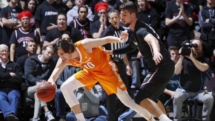CINCINNATI, OH - DECEMBER 18: Jaume Sorolla #35 of the Cincinnati Bearcats defends against John Fulkerson #10 of the Tennessee Volunteers in the first half of the game at Fifth Third Arena on December 18, 2019 in Cincinnati, Ohio. Cincinnati defeated Tennessee 78-66. (Photo by Joe Robbins/Getty Images)