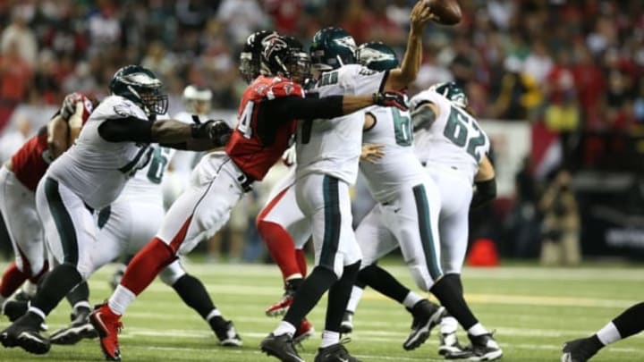 Sep 14, 2015; Atlanta, GA, USA; Atlanta Falcons linebacker Vic Beasley (44) hits Philadelphia Eagles quarterback Sam Bradford (7) as he releases the ball int he second quarter at the Georgia Dome. Mandatory Credit: Jason Getz-USA TODAY Sports