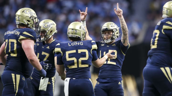 Sep 25, 2021; Atlanta, Georgia, USA; Georgia Tech Yellow Jackets place kicker Brent Cimaglia (42) celebrates after a field goal against the North Carolina Tar Heels in the second half at Mercedes-Benz Stadium. Mandatory Credit: Brett Davis-USA TODAY Sports