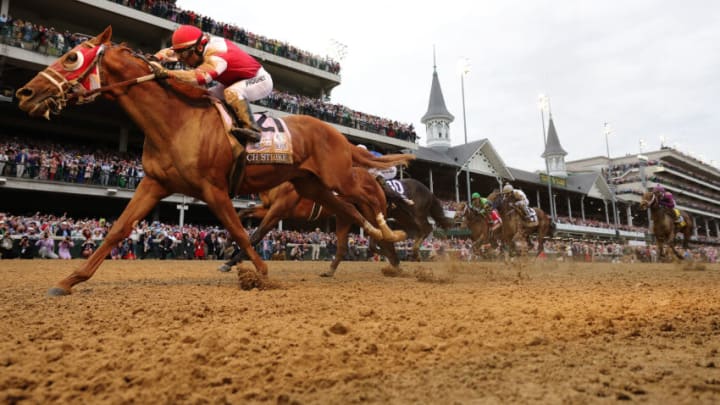 LOUISVILLE, KENTUCKY - MAY 07: Rich Strike with Sonny Leon up crosses the finish line to win the 148th running of the Kentucky Derby at Churchill Downs on May 07, 2022 in Louisville, Kentucky. (Photo by Rob Carr/Getty Images)