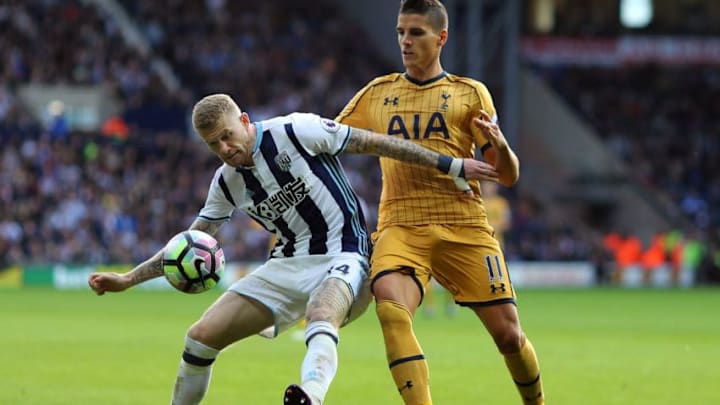 WEST BROMWICH, ENGLAND - OCTOBER 15: James McClean of West Bromwich Albion (L) holds off Erik Lamela of Tottenham Hotspur (R) during the Premier League match between West Bromwich Albion and Tottenham Hotspur at The Hawthorns on October 15, 2016 in West Bromwich, England. (Photo by Richard Heathcote/Getty Images)