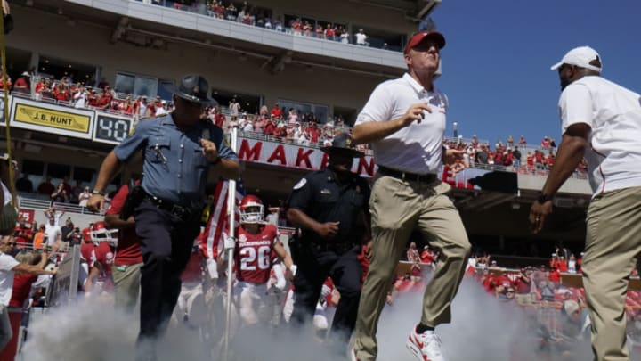 FAYETTEVILLE, AR - SEPTEMBER 15: Arkansas Razorbacks head coach Chad Morris leads his team out on the field before the North Texas Mean Green 44-17 win over the Arkansas Razorbacks on September 15, 2018, at Razorback Stadium in Fayetteville, Arkansas. (Photo by Andy Altenburger/Icon Sportswire via Getty Images)