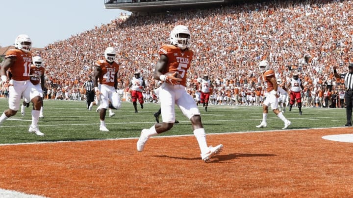 AUSTIN, TX - SEPTEMBER 02: Holton Hill #5 of the Texas Longhorns intercepts a pass and returns it for a touchdown in the first quarter against the Maryland Terrapins at Darrell K Royal-Texas Memorial Stadium on September 2, 2017 in Austin, Texas. (Photo by Tim Warner/Getty Images)
