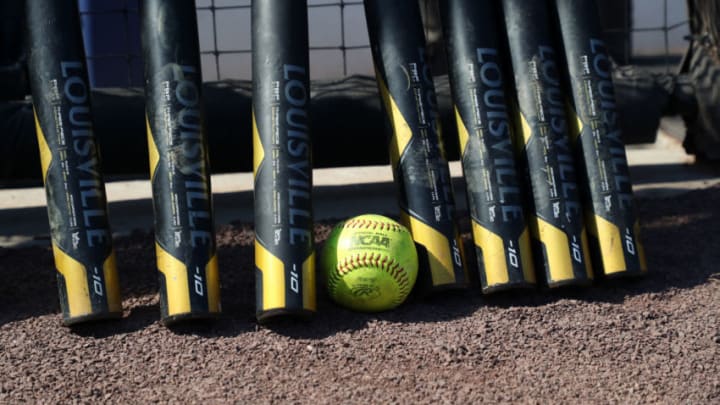 DURHAM, NC - FEBRUARY 29: An NCAA softball amid a collection of softball bats during a game between Notre Dame and Duke at Duke Softball Stadium on February 29, 2020 in Durham, North Carolina. (Photo by Andy Mead/ISI Photos/Getty Images)