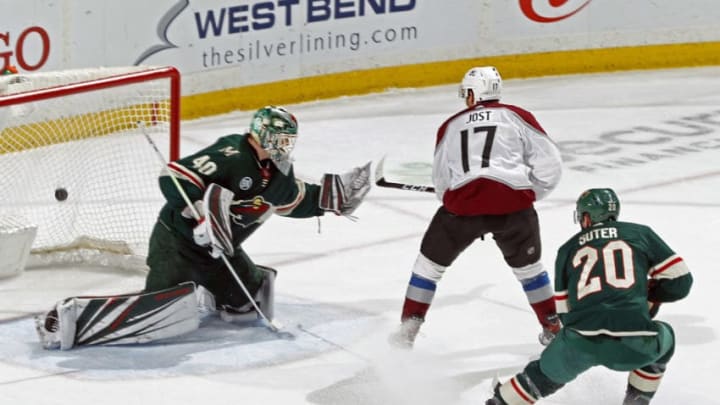 ST. PAUL, MN - MARCH 19: Tyson Jost #17 of the Colorado Avalanche beats Devan Dubnyk #40 of the Minnesota Wild for a 2nd period goal as Ryan Suter #20 of the Minnesota Wild defends during a game at Xcel Energy Center on March 19, 2019 in St. Paul, Minnesota.(Photo by Bruce Kluckhohn/NHLI via Getty Images)