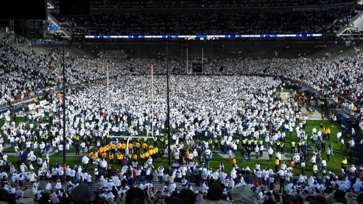 Oct 22, 2016; University Park, PA, USA; Penn State Nittany Lions fans celebrate their teams victory on the field against the Ohio State Buckeyes at Beaver Stadium. Penn State defeated Ohio State 24-21. Mandatory Credit: Rich Barnes-USA TODAY Sports