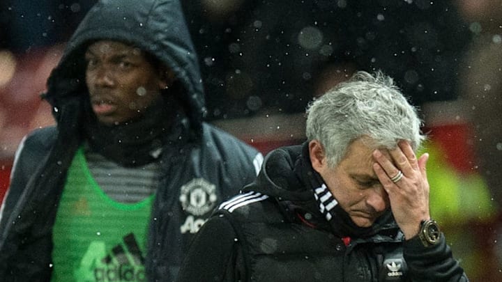(FILES) in this March 17, 2018 file photo, Manchester United's Portuguese manager Jose Mourinho (R) and French midfielder Paul Pogba leave after the English FA Cup quarter-final football match between Manchester United and Brighton and Hove Albion at Old Trafford in Manchester, north west England. - Paul Pogba has been told by Manchester United manager Jose Mourinho he will never captain the club again while the Portuguese remains in charge, according to reports on September 25, 2018, as tensions between United's star midfielder and manager continue to rise. (Photo by Oli SCARFF / AFP) / RESTRICTED TO EDITORIAL USE. No use with unauthorized audio, video, data, fixture lists, club/league logos or 'live' services. Online in-match use limited to 75 images, no video emulation. No use in betting, games or single club/league/player publications. / (Photo credit should read OLI SCARFF/AFP/Getty Images)