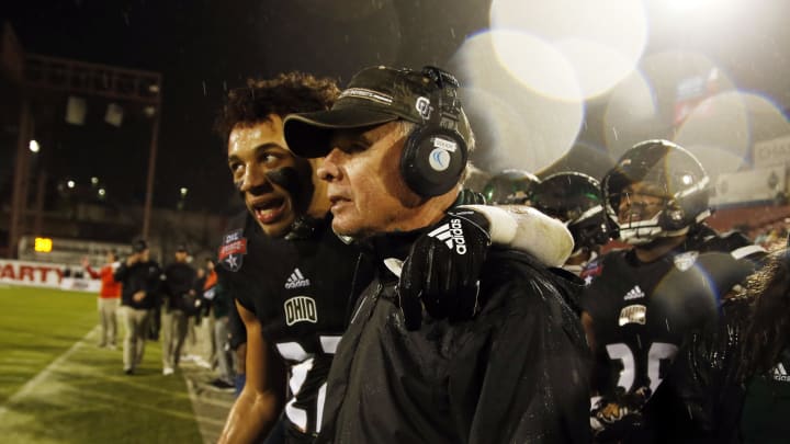 Dec 19, 2018; Frisco, TX, United States; Ohio Bobcats head coach Frank Solich and running back Jake Neatherton (27) celebrate winning the game against the San Diego State Aztecs in the 2018 Frisco Bowl at Toyota Stadium. Mandatory Credit: Tim Heitman-USA TODAY Sports