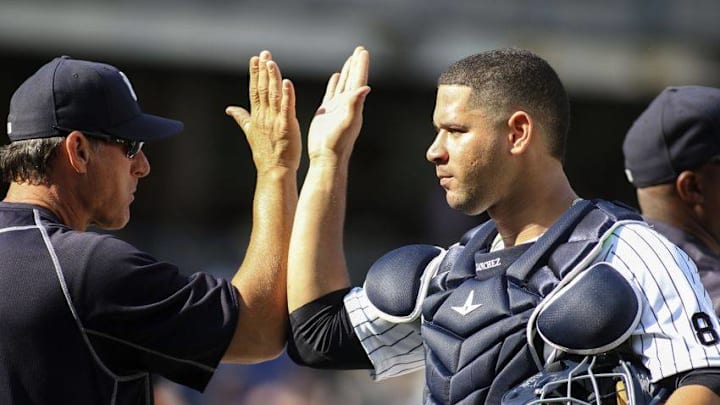 Sep 5, 2016; Bronx, NY, USA; New York Yankees catcher Gary Sanchez (24) is congratulated after the Yankees beat the Toronto Blue Jays 5-3 at Yankee Stadium. Mandatory Credit: Wendell Cruz-USA TODAY Sports