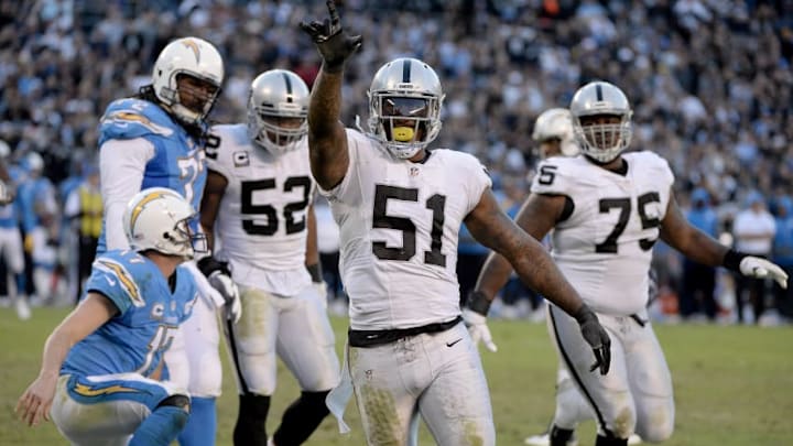 SAN DIEGO, CA - DECEMBER 18: Bruce Irvin #51 of the Oakland Raiders reacts to sacking Quarterback Philip Rivers #17 of the San Diego Chargers late in the fourth quarter en route to the Raiders 19-16 win over Chargers at Qualcomm Stadium on December 18, 2016 in San Diego, California. (Photo by Donald Miralle/Getty Images)