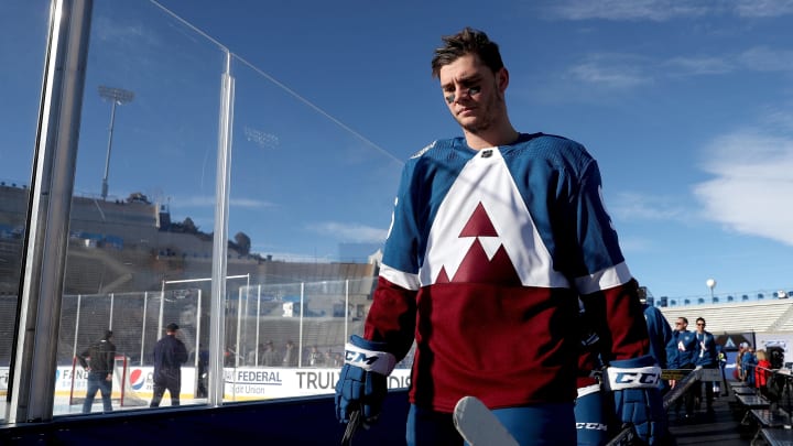 COLORADO SPRINGS, COLORADO – FEBRUARY 14: Andre Burakovsky #95 of the Colorado Avalanche walks to the ice for practice prior to the 2020 NHL Stadium Series game against the Los Angeles Kings at Falcon Stadium on February 14, 2020 in Colorado Springs, Colorado. (Photo by Matthew Stockman/Getty Images)