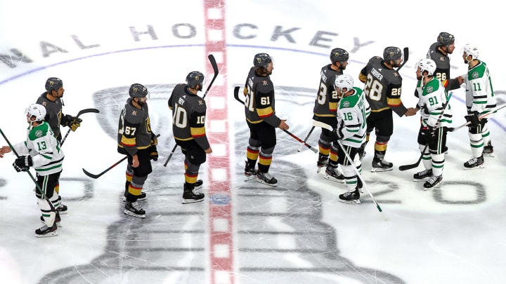 The Vegas Golden Knights and the Dallas Stars shake hands following the Stars 3-2 overtime victory in Game Five