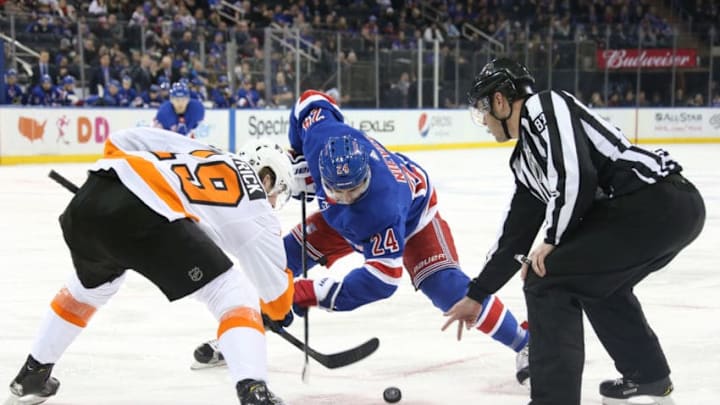 NEW YORK, NY - DECEMBER 23: Boo Nieves #24 of the New York Rangers takes a face off against Nolan Patrick #19 of the Philadelphia Flyers at Madison Square Garden on December 23, 2018 in New York City. (Photo by Jared Silber/NHLI via Getty Images)
