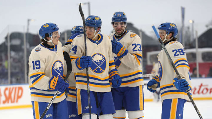HAMILTON, ONTARIO - MARCH 13: Members of the Buffalo Sabres celebrate a goal against the Toronto Maple Leafs in the third period during the Heritage Classic at Tim Hortons Field on March 13, 2022 in Hamilton, Ontario. (Photo by Claus Andersen/Getty Images)