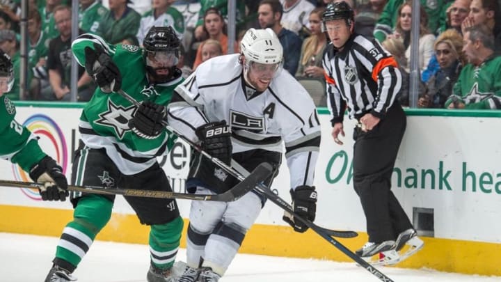 Mar 15, 2016; Dallas, TX, USA; Dallas Stars defenseman Johnny Oduya (47) defends against Los Angeles Kings center Anze Kopitar (11) during the second period at the American Airlines Center. Mandatory Credit: Jerome Miron-USA TODAY Sports