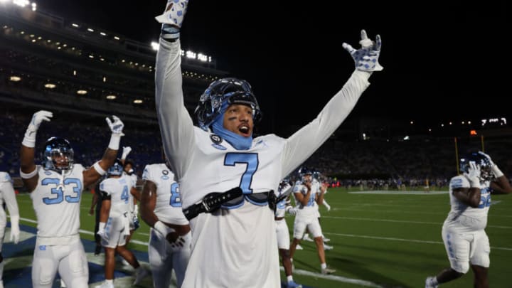 DURHAM, NC - OCTOBER 15: Noah Taylor #7 of the University North Carolina pumps up the second of UNC fans before a game between North Carolina and Duke at Wallace Wade Stadium on October 15, 2022 in Durham, North Carolina. (Photo by Andy Mead/ISI Photos/Getty Images)