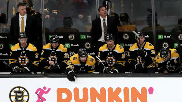 BOSTON - DECEMBER 7: Boston Bruins head coach Bruce Cassidy and the Bruins bench react as time runs out on their first loss in regulation at home this season after the Colorado Avalanche beat the Bruins, 4-1. The Boston Bruins host the Colorado Avalanche in a regular season NHL hockey game at TD Garden in Boston on Dec. 7, 2019. (Photo by Barry Chin/The Boston Globe via Getty Images)