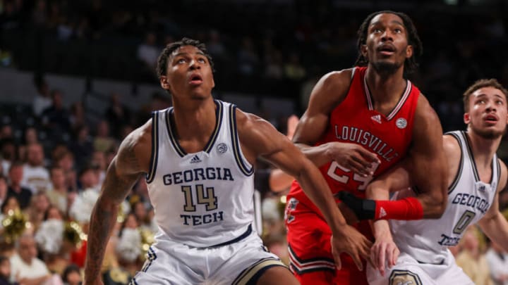Feb 25, 2023; Atlanta, Georgia, USA; Georgia Tech Yellow Jackets forward Jalon Moore (14) boxes out Louisville Cardinals forward Jae'Lyn Withers (24) in the first half at McCamish Pavilion. Mandatory Credit: Brett Davis-USA TODAY Sports