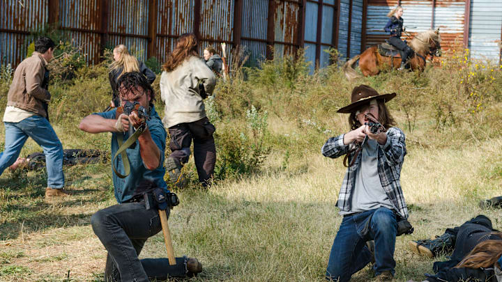 Andrew Lincoln as Rick Grimes, Chandler Riggs as Carl Grimes - The Walking Dead _ Season 7, Episode 16 - Photo Credit: Gene Page/AMC