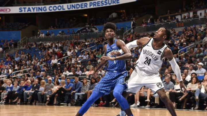 ORLANDO, FL - OCTOBER 24: Jonathan Isaac #1 of the Orlando Magic plays defense against Rondae Hollis-Jefferson #24 of the Brooklyn Nets on October 24, 2017 at Amway Center in Orlando, Florida. NOTE TO USER: User expressly acknowledges and agrees that, by downloading and or using this photograph, User is consenting to the terms and conditions of the Getty Images License Agreement. Mandatory Copyright Notice: Copyright 2017 NBAE (Photo by Gary Bassing/NBAE via Getty Images)