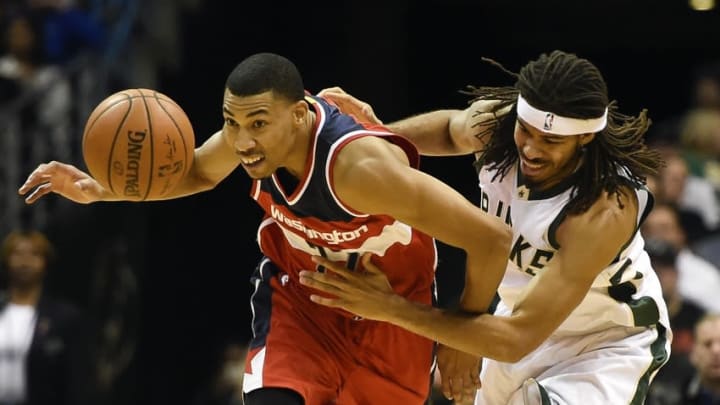 Milwaukee Bucks forward Chris Copeland (9) chases a loose ball in the first quarter at BMO Harris Bradley Center. Mandatory Credit: Benny Sieu-USA TODAY Sports