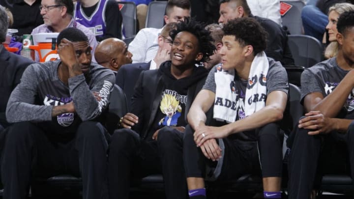 SACRAMENTO, CA - MARCH 9: Iman Shumpert #4, De'Aaron Fox #5 and Justin Jackson #25 of the Sacramento Kings look on during the game against the Orlando Magic on March 9, 2018 at Golden 1 Center in Sacramento, California. NOTE TO USER: User expressly acknowledges and agrees that, by downloading and or using this photograph, User is consenting to the terms and conditions of the Getty Images Agreement. Mandatory Copyright Notice: Copyright 2018 NBAE (Photo by Rocky Widner/NBAE via Getty Images)