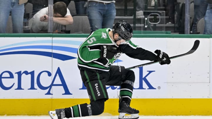 Dec 10, 2022; Dallas, Texas, USA; Dallas Stars defenseman Nils Lundkvist (5) celebrates after he scores the game winning goal against Detroit Red Wings goaltender Ville Husso (not pictured) during the overtime period at the American Airlines Center. Mandatory Credit: Jerome Miron-USA TODAY Sports