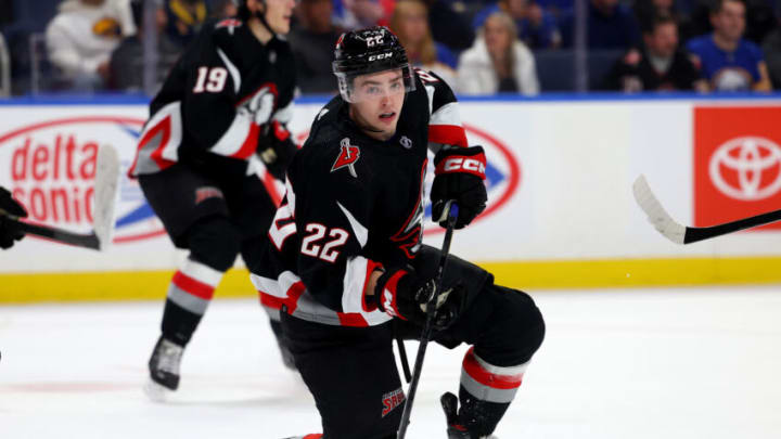 Dec 13, 2022; Buffalo, New York, USA; Buffalo Sabres right wing Jack Quinn (22) looks for the puck during the second period against the Los Angeles Kings at KeyBank Center. Mandatory Credit: Timothy T. Ludwig-USA TODAY Sports