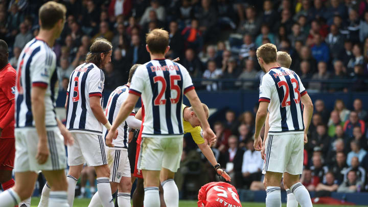 WEST BROMWICH, ENGLAND – MAY 15: Kevin Steward of Liverpool lies injured during the Barclays Premier League match between West Bromwich Albion and Liverpool at The Hawthorns on May 15, 2016 in West Bromwich, England.