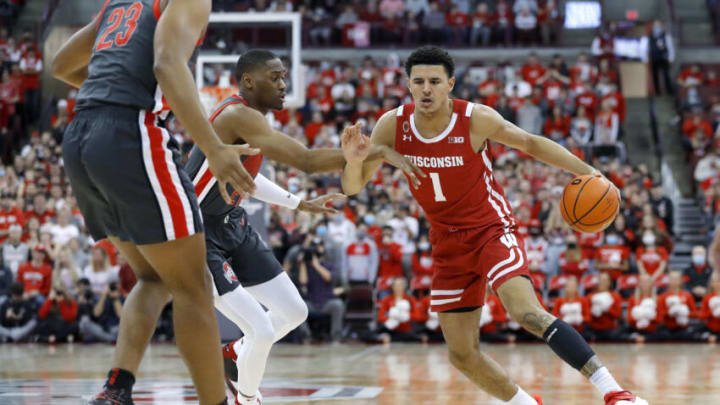 Dec 11, 2021; Columbus, Ohio, USA; Wisconsin Badgers guard Johnny Davis (1) guarded by Ohio State Buckeyes guard Malaki Branham (22) during the first half at Value City Arena. Mandatory Credit: Joseph Maiorana-USA TODAY Sports