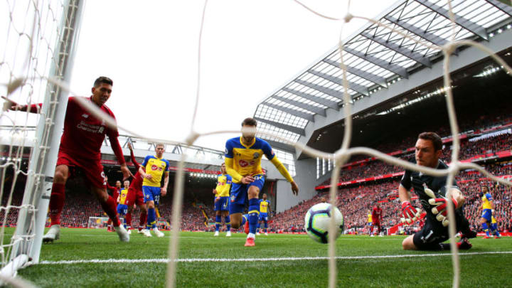 LIVERPOOL, ENGLAND - SEPTEMBER 22: Wesley Hoedt of Southampton scores an own goal for Liverpool's first goal during the Premier League match between Liverpool FC and Southampton FC at Anfield on September 22, 2018 in Liverpool, United Kingdom. (Photo by Alex Livesey/Getty Images)