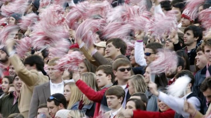 Nov 15, 2014; Tuscaloosa, AL, USA; Alabama Crimson Tide fans wave pom-poms in the second quarter against the Mississippi State Bulldogs at Bryant-Denny Stadium. Mandatory Credit: Marvin Gentry-USA TODAY Sports