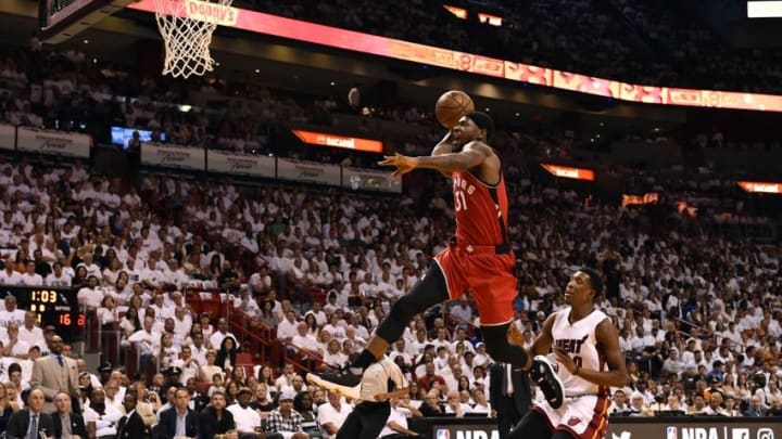 May 13, 2016; Miami, FL, USA; Toronto Raptors forward Terrence Ross (31) shoots the ball as Miami Heat guard Josh Richardson (0) looks on during the first quarter in game six of the second round of the NBA Playoffs at American Airlines Arena. Mandatory Credit: Steve Mitchell-USA TODAY Sports