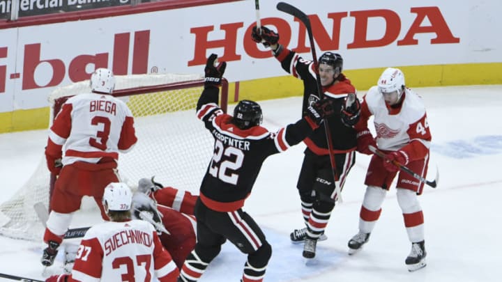 Feb 28, 2021; Chicago, Illinois, USA; Chicago Blackhawks center Ryan Carpenter (22) celebrates his goal against the Detroit Red Wings during the first period at United Center. Mandatory Credit: David Banks-USA TODAY Sports