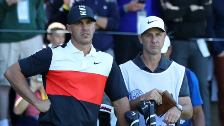 FARMINGDALE, NEW YORK - MAY 16: Brooks Koepka of the United States waits with caddie Ricky Elliott on the 17th tee during the first round of the 2019 PGA Championship at the Bethpage Black course on May 16, 2019 in Farmingdale, New York. (Photo by Warren Little/Getty Images)