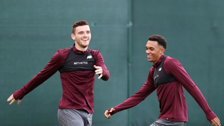 LIVERPOOL, ENGLAND - SEPTEMBER 17: Andy Robertson of Liverpool (L) and Trent Alexander-Arnold of Liverpool take part during a Liverpool training session at Melwood Training Ground on September 17, 2018 in Liverpool, England. (Photo by Mark Robinson/Getty Images)
