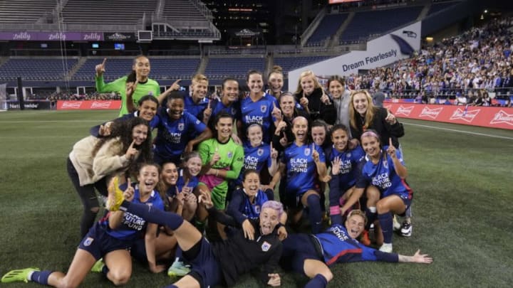 Oct 1, 2022; Seattle, Washington, USA; OL Reign players pose for a team photo after defeating the Orlando Pride at Lumen Field. Mandatory Credit: Stephen Brashear-USA TODAY Sports