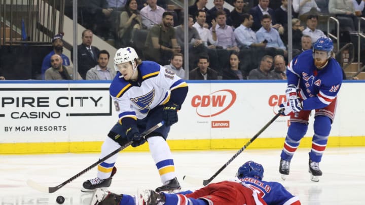 NEW YORK, NEW YORK - MARCH 03: Robert Thomas #18 of the St. Louis Blues skates against Tony DeAngelo #77 of the New York Rangers during their game at Madison Square Garden on March 03, 2020 in New York City. (Photo by Al Bello/Getty Images)