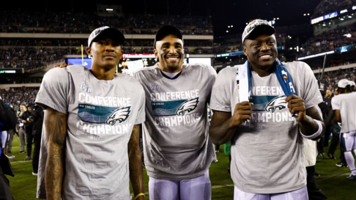 PHILADELPHIA, PA - JANUARY 29: DeVonta Smith #6, Jalen Hurts #1, and A.J. Brown #11 of the Philadelphia Eagles smile for a photo after the Philadelphia Eagles beat the San Francisco 49ers in the NFC Championship NFL football game at Lincoln Financial Field on January 29, 2023 in Philadelphia, Pennsylvania. (Photo by Kevin Sabitus/Getty Images)