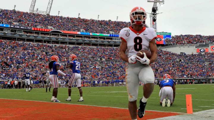 JACKSONVILLE, FLORIDA - NOVEMBER 02: Dominick Blaylock (8) of the Georgia Bulldogs scores a touchdown during a game against the Florida Gators on November 02, 2019 in Jacksonville, Florida. (Photo by Mike Ehrmann/Getty Images)